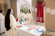 Sisters worked hard to decorate tables, provide displays and cook traditional dishes representing the countries from which their families came.