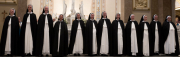 Bishop Spalding asks the sisters who professed vows to face the congregation so they could be congratulated.