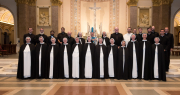 The sisters pose with Bishop Spalding, Mother Anna Grace, Sister Mary Rachel (Director of Novices) and the priest concelebrants at the conclusion of Mass.