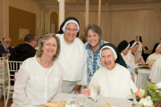 Sister Mary Christopher is joined by family and friends at the luncheon.