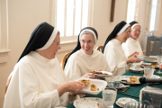 The sisters enjoy a celebratory breakfast with the community.