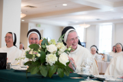 The sisters enjoy a celebratory breakfast with the community.