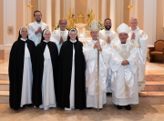 Sister Aimee Marie is joined by Bishop Spalding, Bishop Talley, Mother Anna Grace, Sister Mary Rachel, and concelebrating priests.