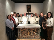 Mother Anna Grace and pilgrims stand in the small chapel in Santa Sabina that had been the cell of St. Dominic when he lived there.