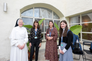 Sister Anne Frances and pilgrims stand on the terrace of the convent, Villaggio Betania.