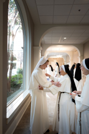 On August 8, the Solemnity of Our Holy Father Saint Dominic, thirteen postulants received the  black and white Dominican habit, beginning their canonical novitiate year.