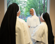 Immediately following, the clothing ceremony, the professed sisters greet the new novices.