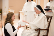 Mother also gives the postulant her new religious name.