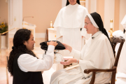 Mother also gives the postulant her new religious name.