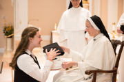 Mother also gives the postulant her new religious name.