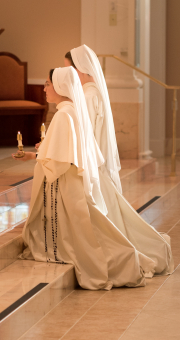 Novices lead the Salve procession to Our Lady's altar every evening.