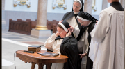 After professing her vows, the prioress general exchanges the white veil for the black veil as an indication of her commitment to follow Christ through the vows of poverty, chastity, and obedience.