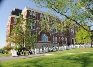 procession of Dominican Sisters going from the chapel to the cemetery