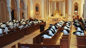 sisters in choir of chapel at Divine Office